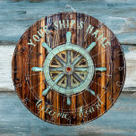Nautiskt tema Bronze Captains Wheel Darttavla<br><div class="desc">Ahoy mateys (Ahoy mateys) - välkomna dina gäster ombord i stil med en underbar vintage,  brushjul på rik kokt trä. Anpassa med ditt namn och meddelande.</div>