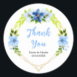 Navy and Baby Blue Floral Wedding Thank You Runt Klistermärke<br><div class="desc">This beautiful and elegant wedding thank you sticker features watercolor baby blue and navy blue flowers with foliage on a gold geometric frame. The text combines handwritten script and serif fonts for a stylish and modern look. This is perfect for a spring or summer rustic wedding.</div>