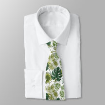 Neck tie with a tropical leaf pattern