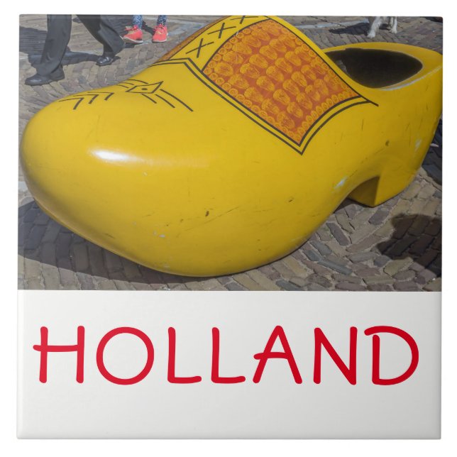 Nederländska träklädsmulor i nära keramiskt platto kakelplatta (Framsidan)