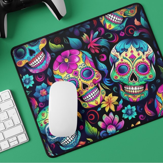 Neon Sugar Skull Musmatta (Mouse pad adorned with brightly colored sugar skulls in pink, green, blue and yellow. )