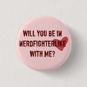 Nerdfighterlike knäppas Pink. Knapp