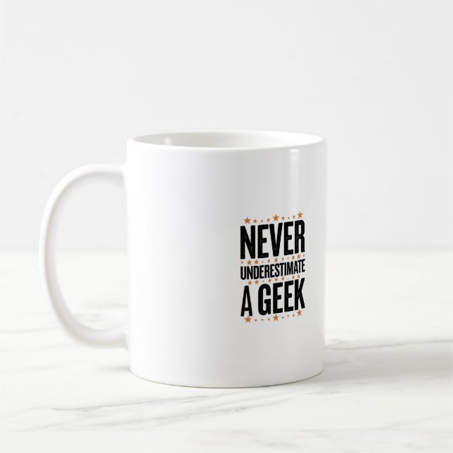 never underestimate a geek kaffemugg (Vänster)