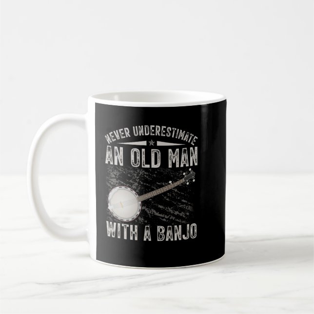 Never Underestimate an Old Man With a Banjo Kaffemugg (Vänster)