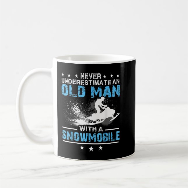 Never underestimate an old man with a snowmobile kaffemugg (Vänster)