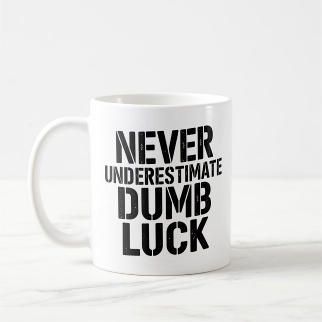 "Never Underestimate Dumb Luck" Saying Kaffemugg (Vänster)
