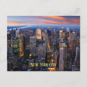 New York-skjutande byggnader vid skymning Vykort