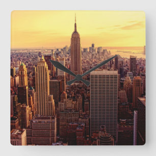 New York-skylinstaden med Empire state Fyrkantig Klocka
