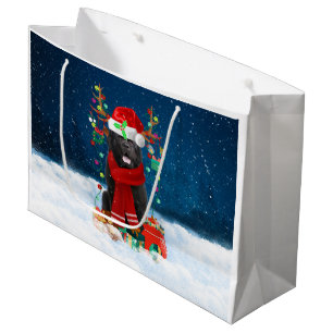 Newfoundland hund med julklappar