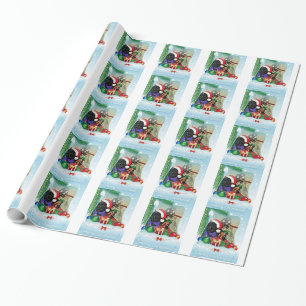 Newfoundland hundjul som slår in papper presentpapper