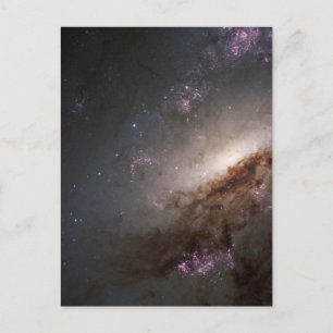 NGC 4258 genomgår intensiv stjärnbildning. Vykort