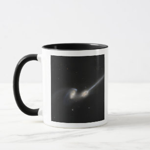 NGC 4676, också som är bekant som musgalaxerna Mugg