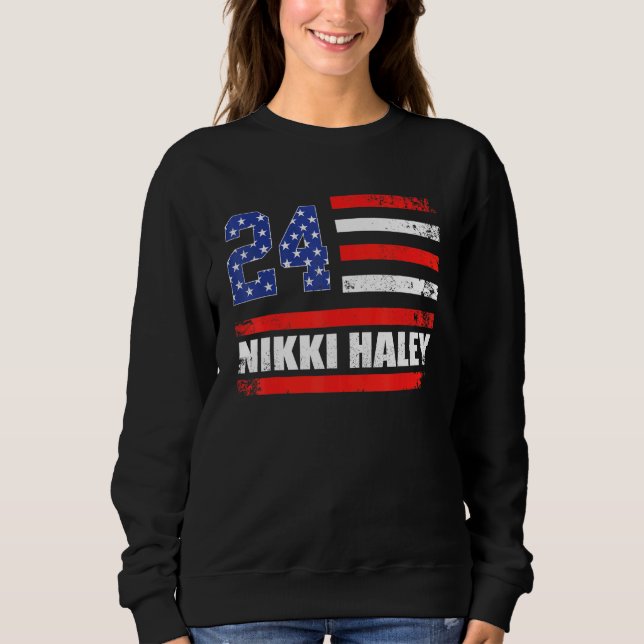 Nikki Haley 2024 American Flagga 1 T Shirt (Framsida)
