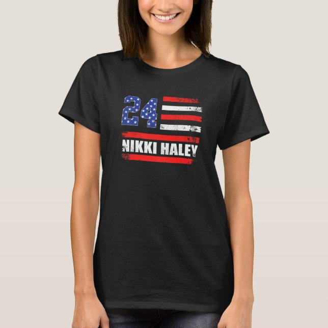 Nikki Haley 2024 American Flagga 1 T Shirt (Framsida)