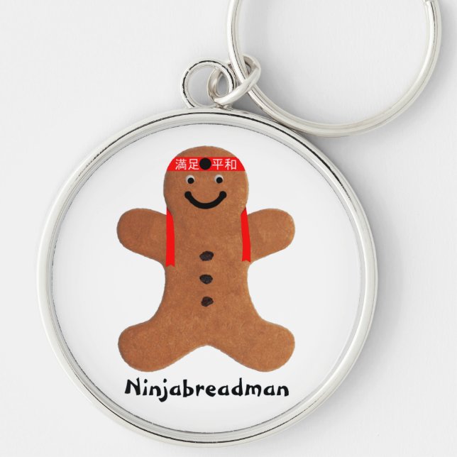 Ninjabredman biscuit (cookie) rund silverfärgad nyckelring (Framsidan)