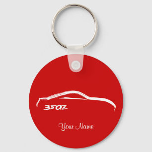 Nissan 350Z vit Brush slår logotypen Nyckelring
