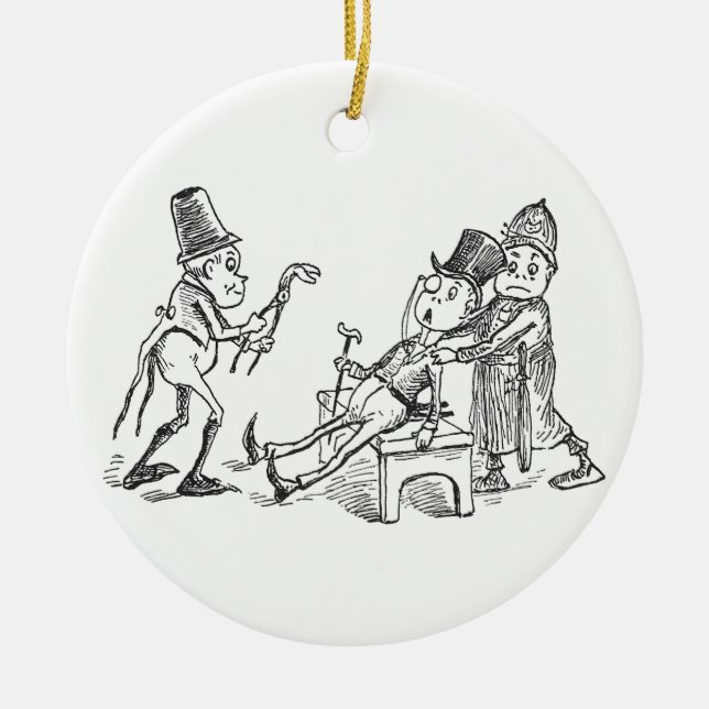 Nissen som drar tänder julgransprydnad keramik (Framsidan)