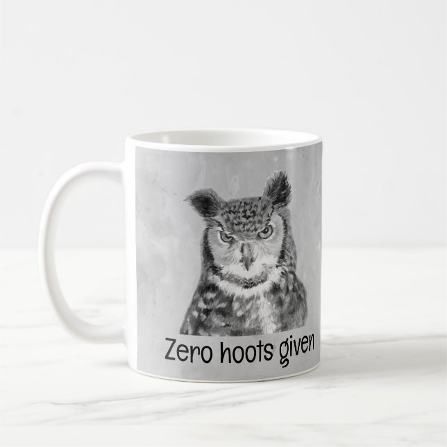 Noll Hoots som fått Sarkastisk Roligt Kaffemugg (Vänster)