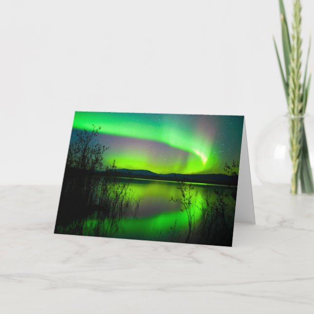 Nordligt ljus som avspeglas på sjön kort (Framsida)