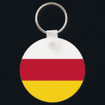 Nordossetiens flagga nyckelring<br><div class="desc">Nordossetien Alanias patriotiska flagga.</div>