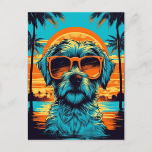 Norfolk Terrier med solglasögon på stranden Vykort