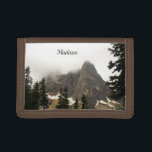 North Cascades Mountain Landscape Photo Wallet<br><div class="desc">A peak of stone in the North Cascade Mountains of Washington state reaches high into the fog. The low clouds hang over the rock tips of the mountain. Below the rocky slopes, patches of snow linger into the summer. Dark and tall evergreen trees loom high in the foreground. Carry this...</div>