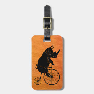 Noshörning som rider en cykel bagagebricka
