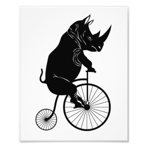 Noshörning som rider en cykel fototryck