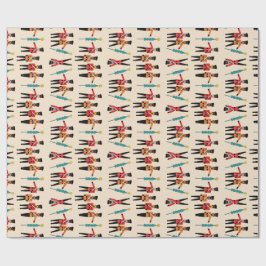 Nötknäppare som dansar slå in papper presentpapper