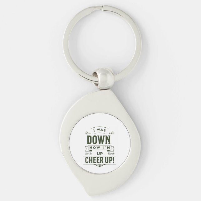 NOW I'M UP CHEER UP METAL KEYCHAIN  SWIRL SILVERFÄRGAD NYCKELRING (Framsidan)