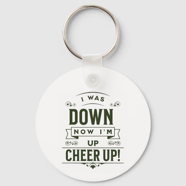 NOW I'M UP CHEER UP ROUND KEYCHAIN  NYCKELRING (Framsida)
