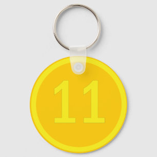 nummer 11 i en cirkel nyckelring
