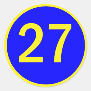 nummer 27 i en cirkel runt klistermärke