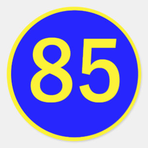 nummer 85, i en cirkel runt klistermärke
