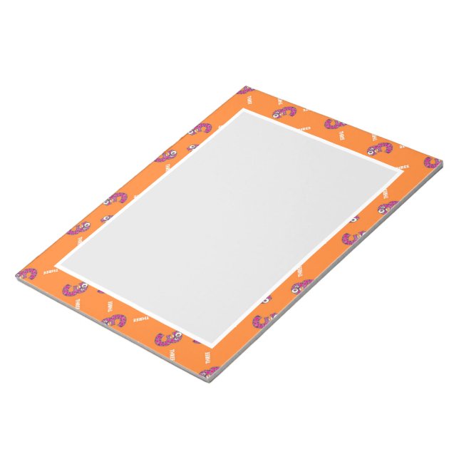 Nummer tre orange anteckningsblock (Vinklad)
