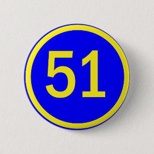 numrera 51, i en cirkla knapp