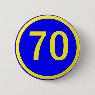 numrera 70, i en cirkla knapp