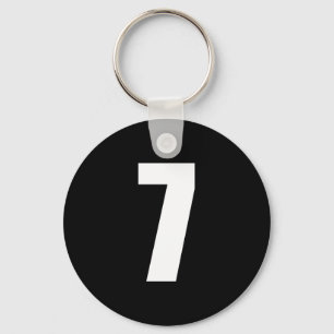 numrera 7 i vit på svart knäppas keychain nyckelring