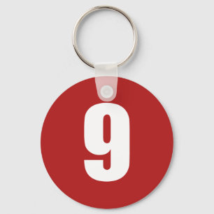 Numrera 9 i vit på rött knäppas keychain nyckelring