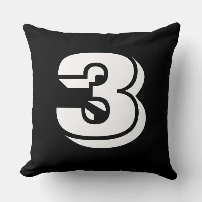 Numrerad - vit på röd kudde (Framsida)