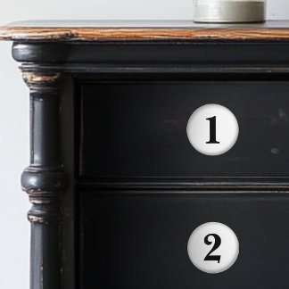 Numrerade svarta och vita keramiska knop knopp