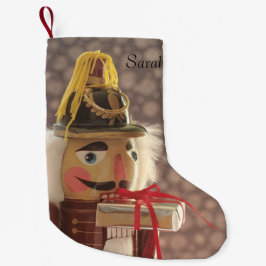 Nutcracker med silver-gåva liten julstrumpa