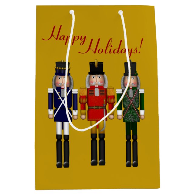 Nutcracker Trio-Guld-GIFT BAG M (Framsidan)