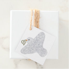 Nyår för en tuggduva med olivfrö gåvor etiketter