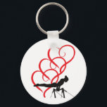 Nyckelkedja för Gymnastikknapp. Nyckelring<br><div class="desc">Gymnastikknappens nyckelkedja med gymnast och röda hjärtan.</div>