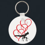Nyckelkedja för Gymnastikknapp. Nyckelring<br><div class="desc">Gymnastikknappens nyckelkedja med gymnast och röda hjärtan.</div>