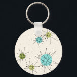 Nyckelkedja för Iconic Atomic Starbursts Nyckelring<br><div class="desc">Den här Iconic Atomic Starbursts Button Keychain mönster har ikoniska atomstjärnor. Det är höger! Bakgrunden till färgaden av old school, kräm med guld-spekkler är bakgrunden till perfekten för den pulserande turkosen, soothing celery och kitschy pear grönt färgad circles. Sportarna i färg placeras sporadiskt i olika storlekar med överliggande V-formad linjer...</div>