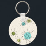 Nyckelkedja för Iconic Atomic Starbursts Nyckelring<br><div class="desc">Den här Iconic Atomic Starbursts Button Keychain mönster har ikoniska atomstjärnor. Det är höger! Bakgrunden till färgaden av old school, kräm med guld-spekkler är bakgrunden till perfekten för den pulserande turkosen, soothing celery och kitschy pear grönt färgad circles. Sportarna i färg placeras sporadiskt i olika storlekar med överliggande V-formad linjer...</div>