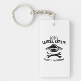 nyckelkedja med svarta Bob Saucer Repair logotyp