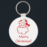 Nyckelkedja - Santa's Ansikte Nyckelring<br><div class="desc">Tomten är ansikte med ord "God jul!" nedan. Bild och text i rött.</div>